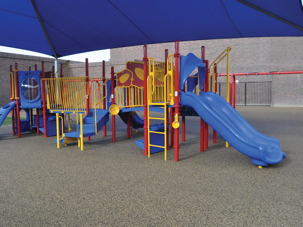 Playground and Swings with poured-in-place rubber surfacing by ARS